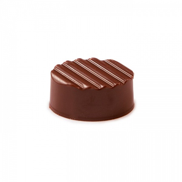 okrogla čokoladna pralina s posebni vzorčkom na vrhu