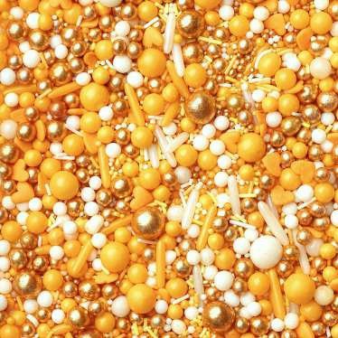 rumeno zlat sladkorni posip za dekoriranje sladic, peciva in sladoleda